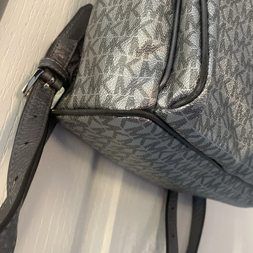 Michael Kors Silver shimmer Monogram Backpack shiny zipper leather compartments‎